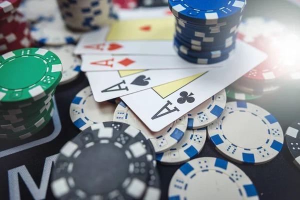 Live dealer at mamajitu4d Togel Market table with cards and chips